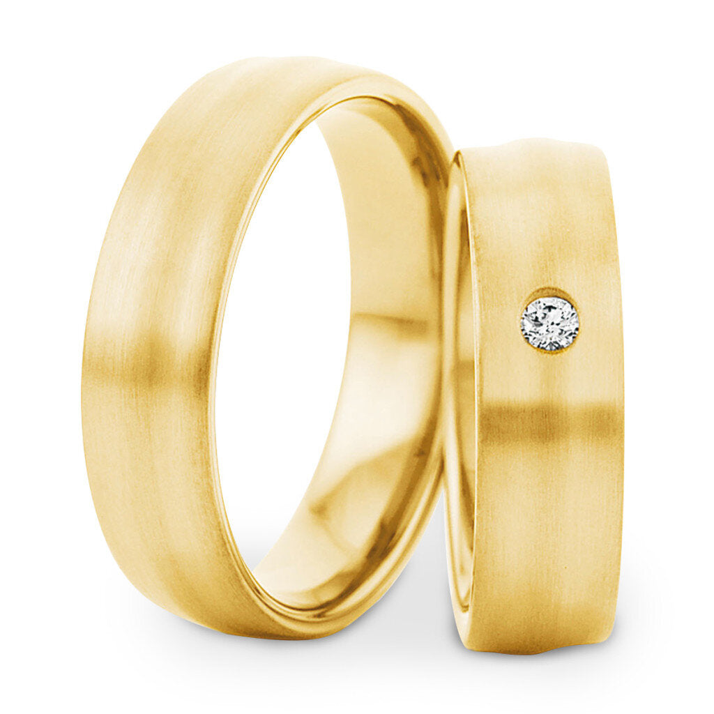 Trauringe - Gelbgold mit einem Diamanten (0,055 ct.) im Wave-Design