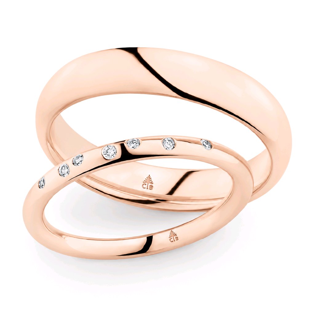 Trauring-Paar RM4779 und 30045 aus 585er Roségold mit sieben natürlichen Diamanten im Damenring – MARRYING München