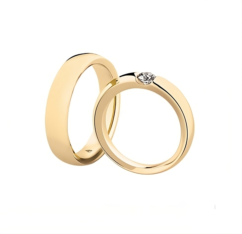 Trauringe - Gelbgold mit einem Diamanten (0,25 ct.)
